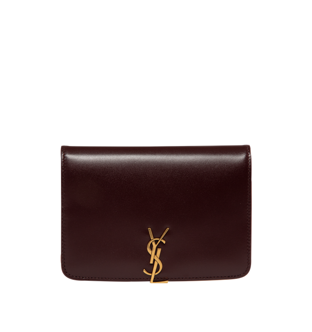 Image 1 of 3 - RED - Saint Laurent VOLTAIRE passport holder with inner card slots, decorated with the CASSANDRE. Featuring leather lining, bronze-toned hardware, two flat pockets, five card slots. Measures 5.3" x 3.9" x 0.8". Made in Italy.