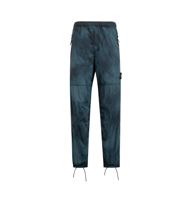 Image 1 of 3 - BLUE - STONE ISLAND Trousers featuring elastic waist, zipper side pockets, logo patch and drawstring on hem.