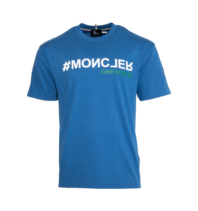 Image 1 of 3 - BLUE - MONCLER GRENOBLE Logo T-Shirt featuring ribbed crew neck, short sleeves, side vents, logo and number details and embossed logo outline. 100% cotton. 
