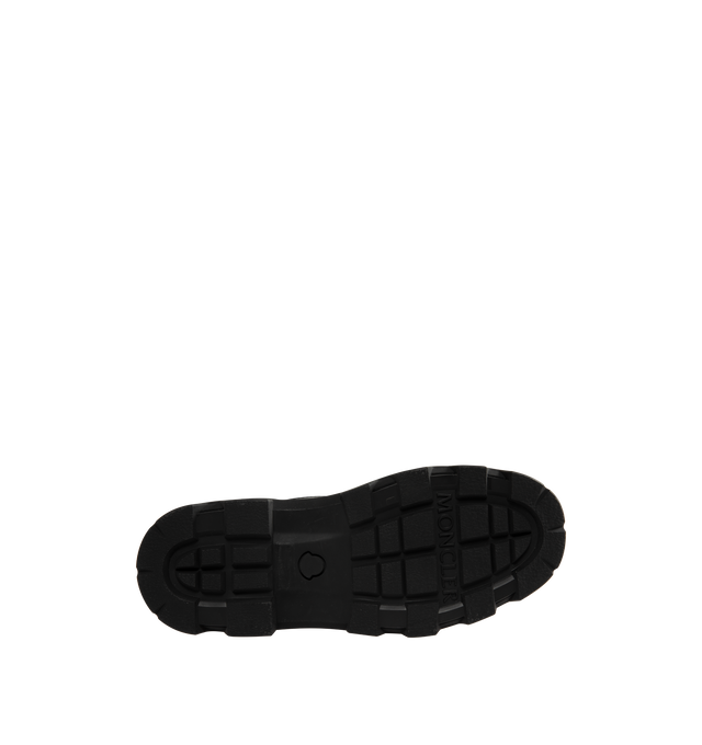 Image 4 of 5 - BLACK - Moncler Womens Aurea Ankle Boots are crafted from leather with polyamide and nylon accents and feature a round toe, lace-up closure, leather lining, and a durable elastodiene sole. These designer ankle boots combine a classic lace-up silhouette with performance-inspired detailing for versatile everyday wear. Main Material: Leather, Polyamide, Nylon; Lining: Leather; Sole: Elastodiene. Made in Italy.