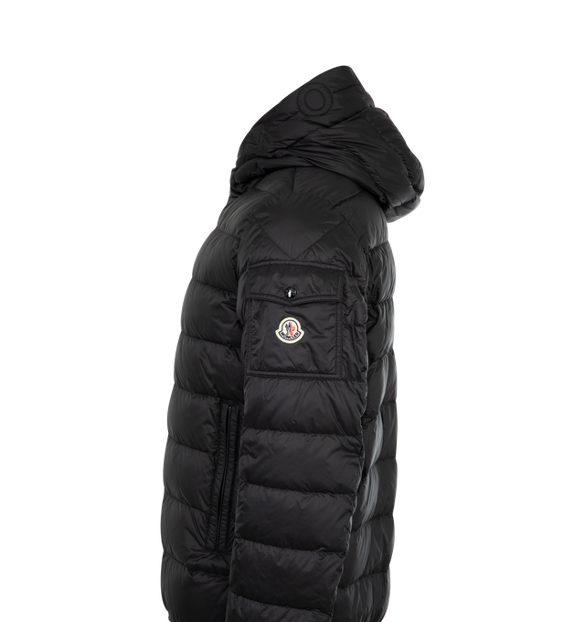 Image 3 of 3 - BLACK - MONCLER Najan Hooded Short Down Jacket featuring longue saison lining, down-filled, hood, zipper closure, zipped pockets, sleeve pocket with snap button closure, adjustable cuffs and quilted logo. 100% polyamide/nylon. Padding: 90% down, 10% feather.