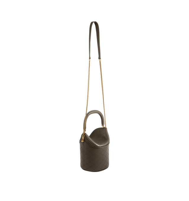 Image 2 of 3 - GREEN - SAINT LAURENT Gaby Top Handle Bucket Bag with flap top with magnetic closure, decorated with Cassandre and diamond-quilted overstitching. Features a rotating leather top handle and detachable leather and chain strap designed for shoulder or cross-body carry. Lambskin leather with bronze-tone hardware. Measures 7.5" X 6.7" X 5.9" with strap drop 22.8". Made in Italy.