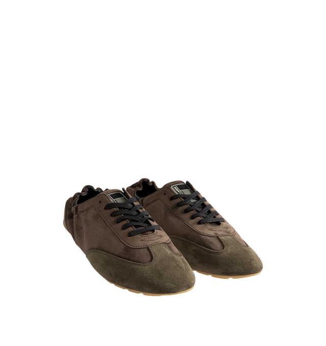Image 2 of 5 - BROWN - Saint Laurent Men's 'Lewis 05' sneakers are cut from tonal panels of suede and velvet. Elasticated trims allow for easy entry, while a logo-embossed patch at the heel offers a signature house finish. Material: leather (suede); Lining: leather; Sole: leather insole, rubber sole; Toe shape: round toe. Made in Italy