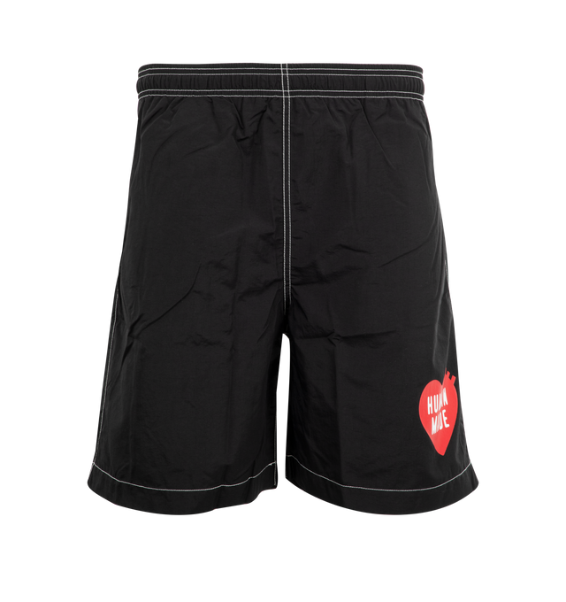 Image 1 of 3 - BLACK - HUMAN MADE Swim Shorts featuring contrast stitching, logo printed at front leg, side pockets, back welt pocket and elastic waist.