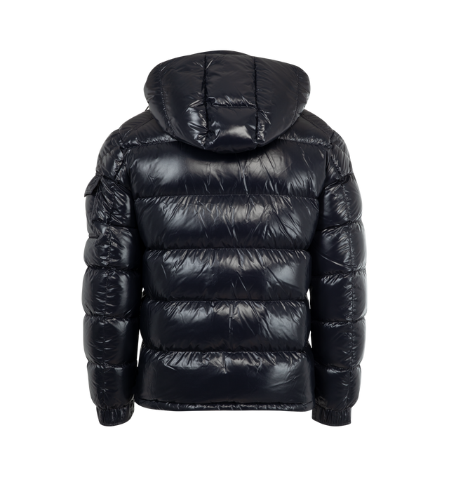 Image 3 of 4 - NAVY - MONCLER Maya Jacket featuring nylon laqu lining, down-filled with boudin quilting, detachable hood with snap buttons, adjustable with drawstring fastening, two-way zipper closure, zipped pockets, adjustable, elasticized cuffs with snap buttons, hem with drawstring fastening, flap patch pocket on sleeve and felt Moncler logo on sleeve. 100% polyamide/nylon. Padding: 90% down, 10% feather.
