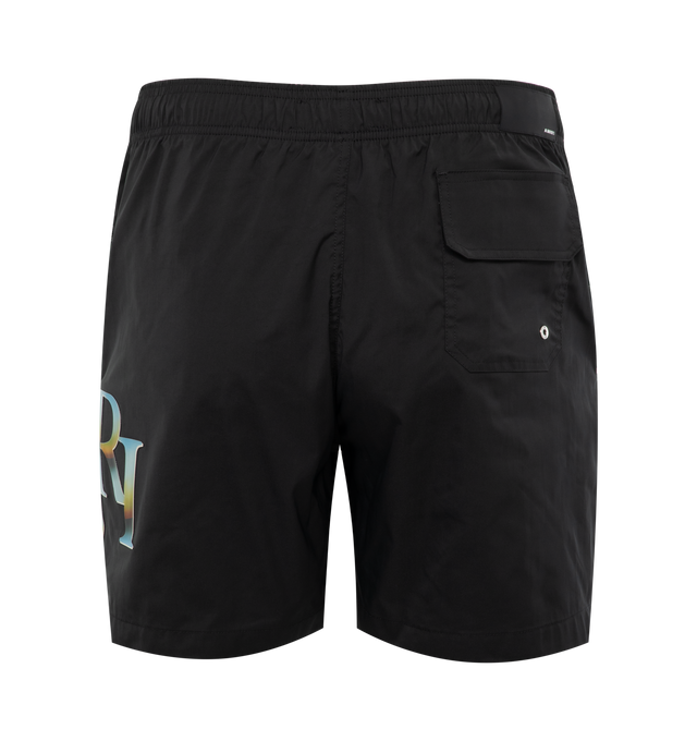 Image 2 of 3 - BLACK - AMIRI Staggered Chrome Swim Trunk featuring elastic waistband with drawstring tie closure, 3-pocket styling, side Amiri logo detail and mesh lining. 100% polyester. 