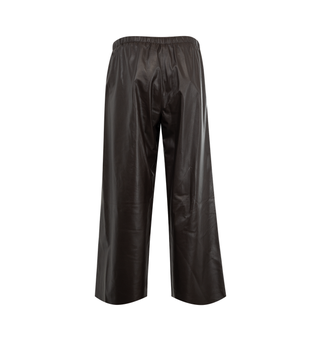 Image 2 of 3 - BROWN - THE ROW Yani Pant featuring elastic waist with concealed drawstring, wide legs and faux zip closure. 100% lambskin. Lining: 100% silk. Made in Italy.