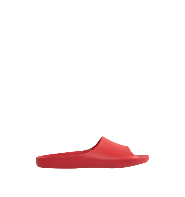 Image 1 of 5 - RED - THE ROW Ama Slide featuring smoothly curved slide sandal in lightweight rubber with contoured footbed and seamless construction. 100% rubber. Made in Italy.