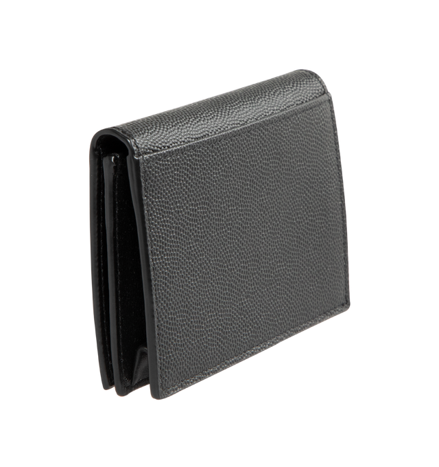 Image 2 of 3 - BLACK - SAINT LAURENT Falp Cardholder featuring business card case with embossed saint laurent signature made with metal-free tanned leather, 2 internal card compartments, 2 internal card slots and 1 receipt compartment. 4.3 x 2.9 x 0.4 inches. 100% calfskin leather. Made in Italy.