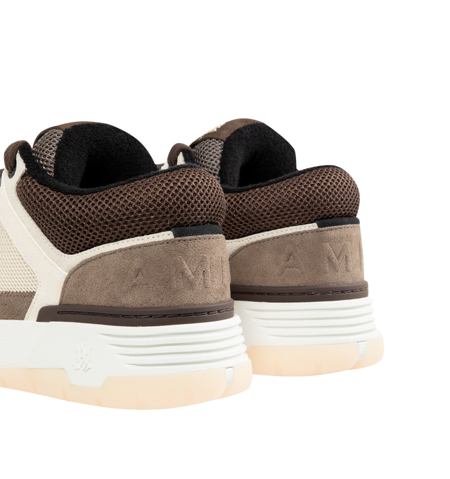 Image 3 of 5 - BROWN - AMIRI MA-1 Sneakers featuring low-top buffed leather and mesh sneakers, graphic perforations at toe, lace-up closure, logo patch at padded tongue, padded collar, logo embossed at heel counter, perforations and logo hardware at sides, terrycloth lining, logo graphic embossed at textured rubber midsole and treaded rubber sole. Upper: leather, textile. Sole: rubber.