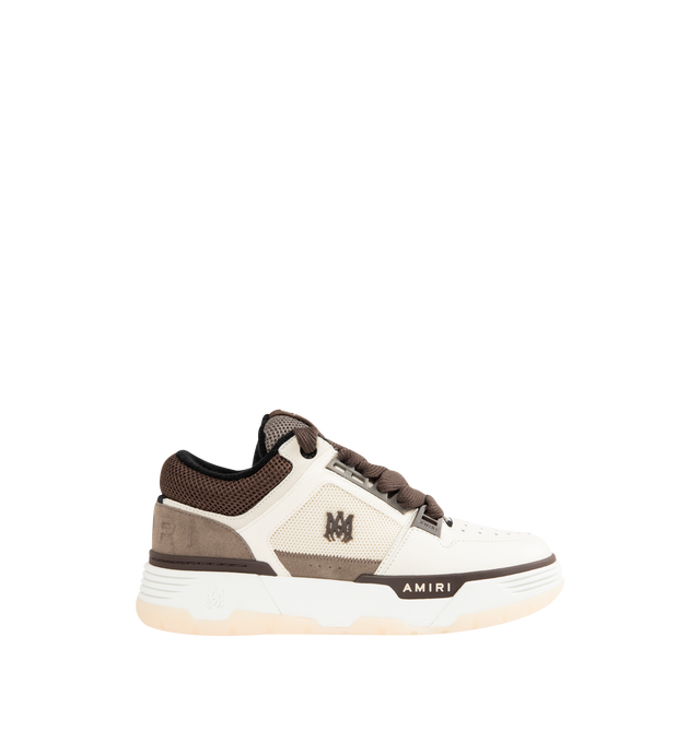 Image 1 of 5 - BROWN - AMIRI MA-1 Sneakers featuring low-top buffed leather and mesh sneakers, graphic perforations at toe, lace-up closure, logo patch at padded tongue, padded collar, logo embossed at heel counter, perforations and logo hardware at sides, terrycloth lining, logo graphic embossed at textured rubber midsole and treaded rubber sole. Upper: leather, textile. Sole: rubber.