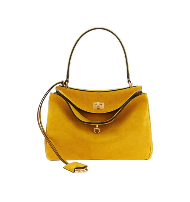 Image 1 of 2 - YELLOW - BALENCIAGA Rodeo Handbag Small in waxed suede calfskin and smooth calfskin featuring one handle, removable shoulder strap, turn lock closure, wide front pocket, 1 main compartment, 1 inner zipped pocket, 2 flat pockets at back, side snaps, 4 brass feet and nappa lambskin lining. Calfskin. Made in Italy.