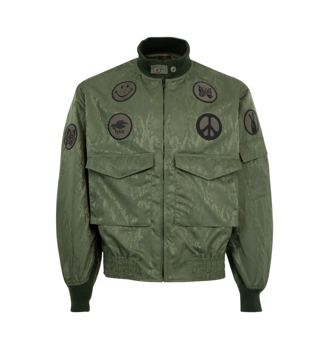 Image 1 of 3 - GREEN - NEEDLES G-8 Jacket featuring front zip closure, 2-pocket styling, embroidered iron-on badges, elastic waistband and midweight ripstop fabric. 100% cotton. Made in Japan.