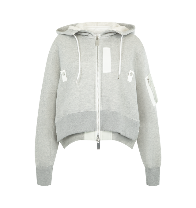 Image 1 of 3 - GREY - SACAI Sponge Sweat x Nylon Twill Hoodie featuring padded cotton-blend jersey hoodie, drawstring at hood, two-way zip closure, logo-engraved press-stud tab at chest, concealed welt pockets, rib-knit hem and cuffs, cropped hem, utility pocket and pen slots at sleeve, dropped shoulders and nylon satin underlay. 62% cotton, 38% polyester. Lining: 55% polyester, 44% cotton, 1% polyurethane. Fill: 100% polyester. Made in Japan.