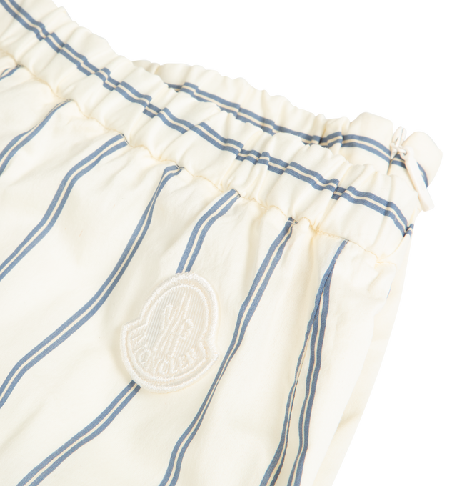 Image 2 of 2 - WHITE - MONCLER Striped Cotton & Silk Pants featuring striped cotton and silk blend voile, invisible zipper closure, seam pockets, elasticized waistband and logo patch. 80% cotton, 20% silk.
