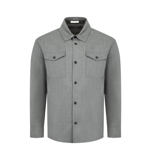 Image 1 of 2 - GREY - THE ROW Dashiell Shirt featuring oversized button-up shirt in virgin wool flannel with curved hem, buttoned patch pockets and exposed front placket with button closure. 100% wool. Lined in 100% cotton. Made in Italy.