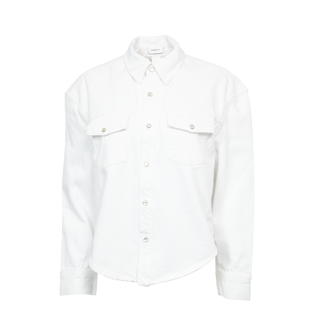 Image 1 of 3 - WHITE - WARDROBE.NYC Cropped Denim Jacket featuring classic collar, front press-stud fastening, drop shoulder, long sleeves, press-stud fastening cuffs, two button-fastening chest pockets, curved hem and cropped. 