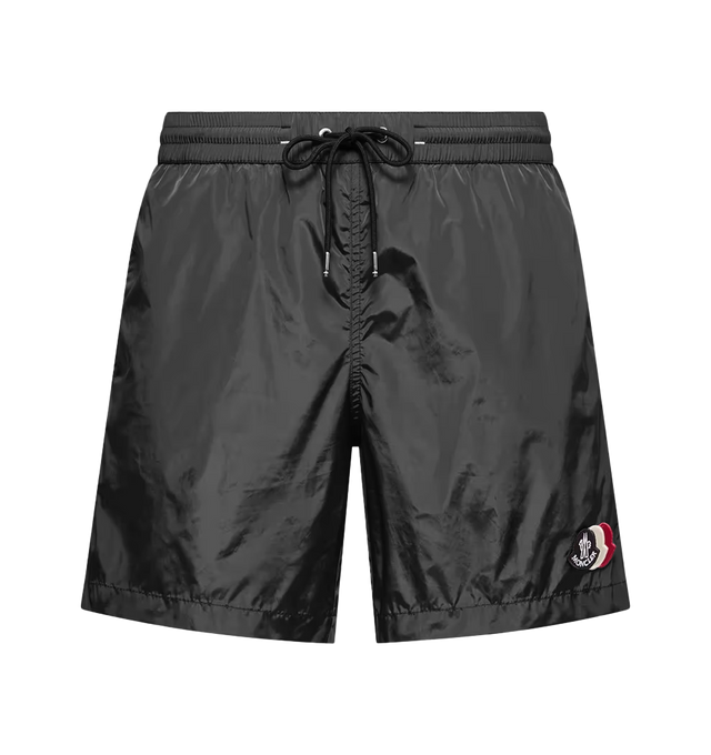 Image 1 of 1 - BLACK - MONCLER Logo Patch Swim Shorts featuring nylon technique, mesh lining, waistband with drawstring fastening, side pockets, zipped back pocket with tricolor trim and logo patch. 100% polyamide/nylon.