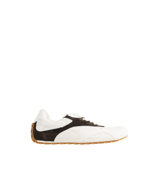 Image 1 of 5 - WHITE - BOTTEGA VENETA Orbit Flash Sneaker featuring low-top lace-up sneaker in soft suede and lightweight nylon. Rubber outsole. Made in Italy.