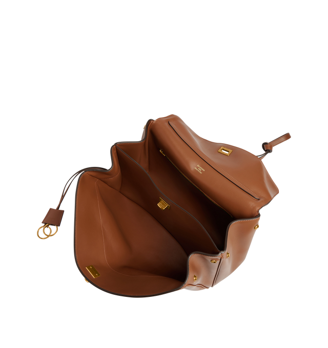 Image 5 of 5 - BROWN - BALENCIAGA Rodeo Top Handle Bag featuring a turn lock closure, a single top handle for hand carrying, an adjustable shoulder strap, side snaps, brass feet, a removable leather keychain holder, a wide front pocket and an interior zipper pocket. 13.8 X 9.2 X 4.3 inches. 100% calfskin. Made in Italy.