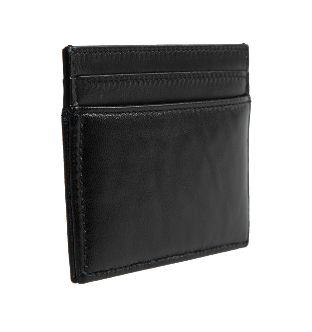 Image 2 of 3 - BLACK - SAINT LAURENT Card Holder featuring leather exterior and interior, gold-tone cassandre hardware at front, 4 card slots and center compartment. 4" W x 3" H. 