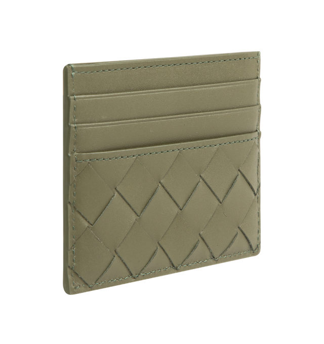 Image 2 of 3 - GREEN - BOTTEGA VENETA Intrecciato Credit Card Case featuring six card slots, one central pocket and intrecciato calf leather. 3.1" x 4.1" x 0.2". Calfskin. Made in Italy.