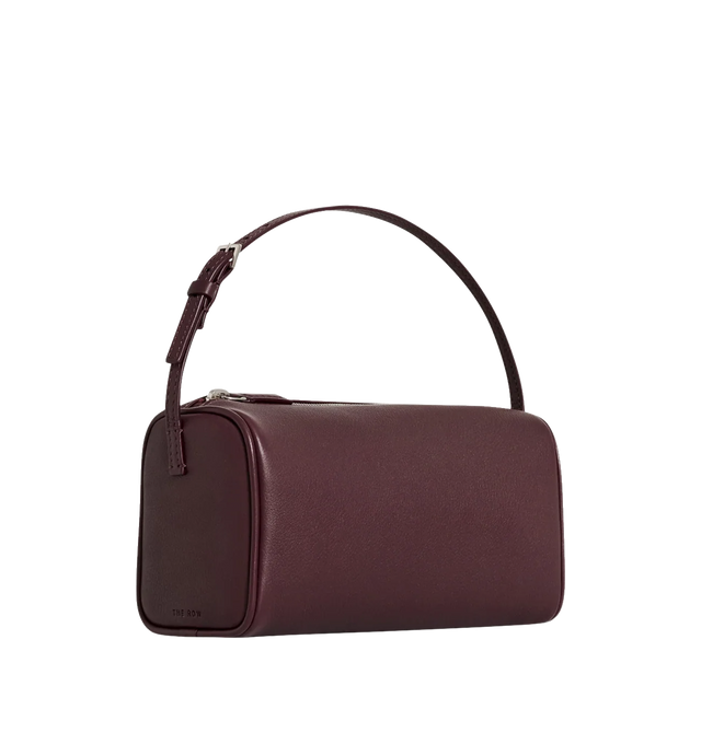 Image 2 of 3 - RED - THE ROW 90'S Bag featuring top handle bag in finely grained calfskin leather with softly rounded edges, leather piping and adjustable slim leather strap. Measures 7.7 x 4.5 x 3 in. 100% calfskin leather. Made in Italy.