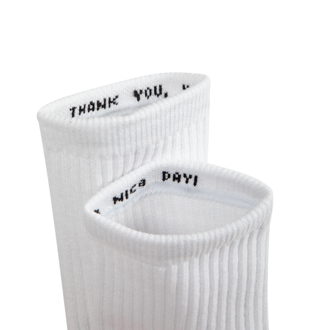 Image 4 of 5 - WHITE - MARKET Smiley Heel Socks featuring a soft and stretchy cotton/spandex blend, comfortable, breathable fit and Smiley graphic on the heel.