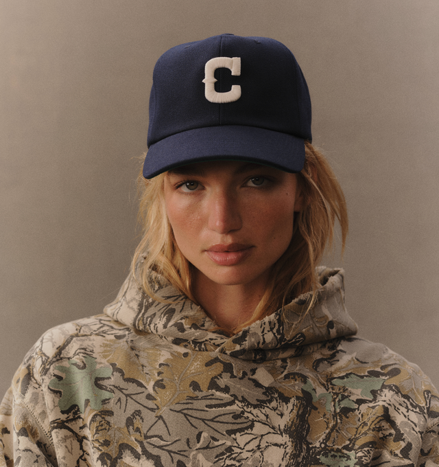 Image 5 of 6 - NAVY - Cherry LA Wool 5 Panel Hat is crafted from polyester and features a classic six-panel silhouette with embroidered detailing at the front and back. Designed with a branded flag tab at the back and an adjustable plastic snap closure, this everyday cap combines clean styling with signature Cherry LA branding.