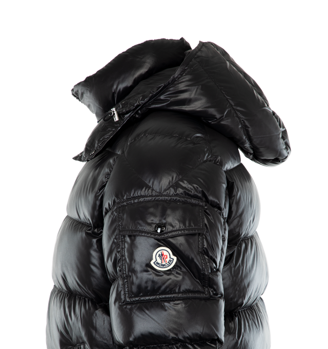 Image 3 of 3 - BLACK - MONCLER Maya Jacket featuring nylon laqu lining, down-filled with boudin quilting, detachable hood with snap buttons, adjustable with drawstring fastening, two-way zipper closure, zipped pockets, adjustable, elasticized cuffs with snap buttons, hem with drawstring fastening, flap patch pocket on sleeve and felt Moncler logo on sleeve. 100% polyamide/nylon. Padding: 90% down, 10% feather.
