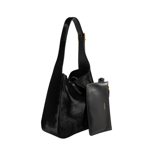 Image 2 of 3 - BLACK - SAINT LAURENT Le 5 7 Small Bag featuring an inner pouch, leather tab closure decorated with the cassandre, adjustable strap and bronze-tone hardware. Calfskin leather. Made in Italy.