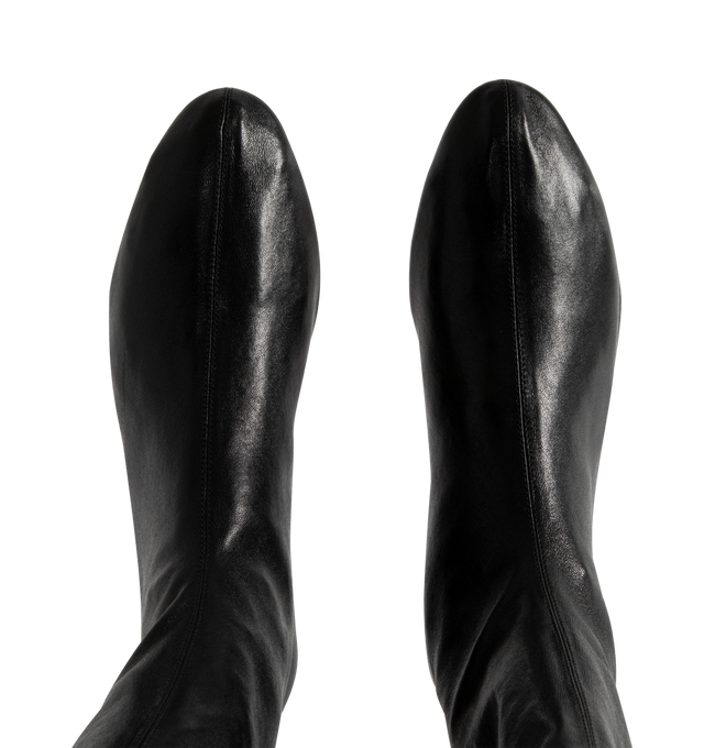 Image 4 of 4 - BLACK - Apollo Flat Ankle Boot featuring a sleek boot shaped by softened lines, a rounded toe inspired and a back zipper. 100% lambskin. Made in Italy.