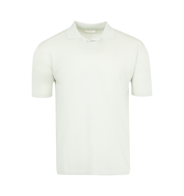 Image 1 of 2 - GREEN - THE ROW Mauro Top featuring short-sleeved polo top in ultrafine wool knit with slim fit, buttonless front tab, and signature center back detail. 100% wool. Made in Italy.
