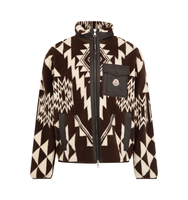 Image 1 of 1 - BROWN - Moncler Men's Teddy Zip-Up Cardigan is crafted from plush teddy fabric and features a loose fit, nylon trim at the opening and collar, and a front zip closure. Inspired by mountain landscapes, the design is finished with zipped pockets, a nylon chest pocket with snap-button closure, and a signature logo patch. Main Material: 74% Polyester, 26% Acrylic. Collar: 100% Polyamide. Trim: 100% Polyamide. Body Lining: 100% Polyester. Padding: 100% Polyester. Fit: Loose. Closure: Front Zip. Po