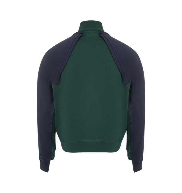 Image 2 of 2 - GREEN - VETEMENTS Patched Zip-Up Jacket featuring cotton-blend French terry, paneled construction, raw edge throughout, rib-knit stand collar, hem, and cuffs, two-way zip closure, embroidered text at front, welt pockets at waist, raglan sleeves and logo embroidered at back collar. 80% cotton, 20% polyester. Made in Portugal.