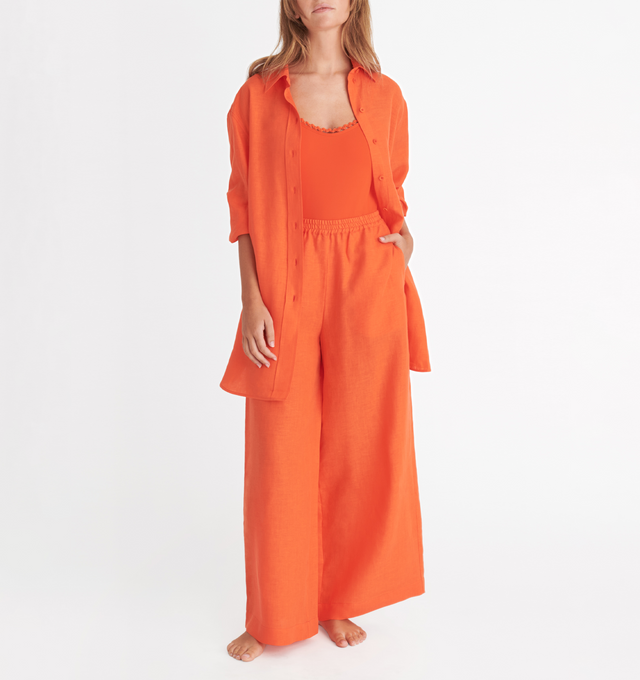 Image 2 of 4 - ORANGE - ERES Mignonette Shirt featuring long sleeves, pleated cuffs and yoke in the back with rounded slits on each side at the hem. 100% Linen. Made in Bulgaria. 