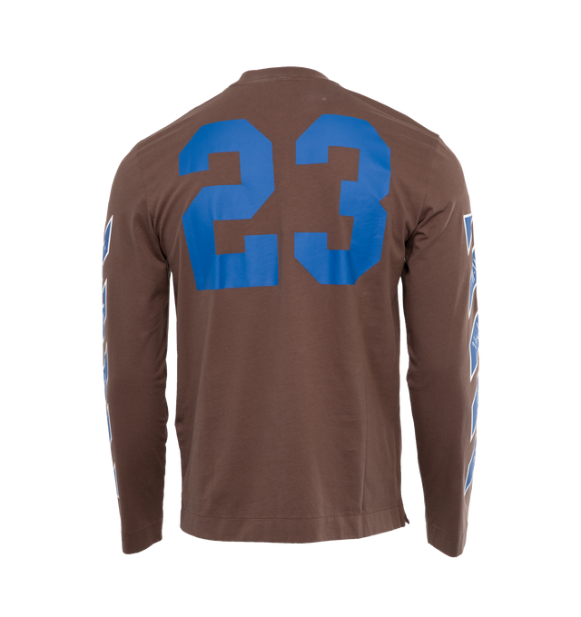 Image 2 of 5 - BROWN - OFF-WHITE 23 VARSITY SKATE L/S TEE has the number 23 on the front left chest in blue, crew neck, pull over style, drop shoulder, long sleeves, logo print at the chest, signature Diag-stripe print going down the sides of the sleeves in blue and white and numerical 23 print at rear in blue. 100% cotton. 