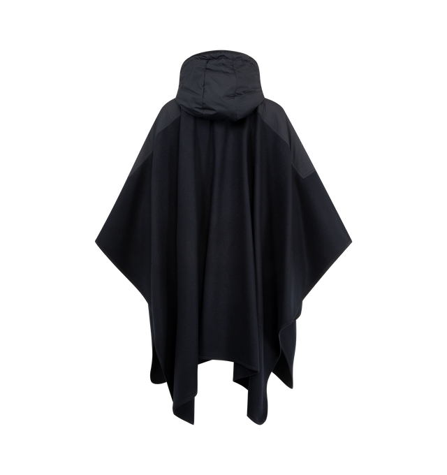 Image 2 of 3 - NAVY - MONCLER Cape featuring a two-way zip fastening, logo patch details one sleeve, hood and snap closure pockets. 75% virgin wool, 25% polyamide. Trim: 100% polyester.