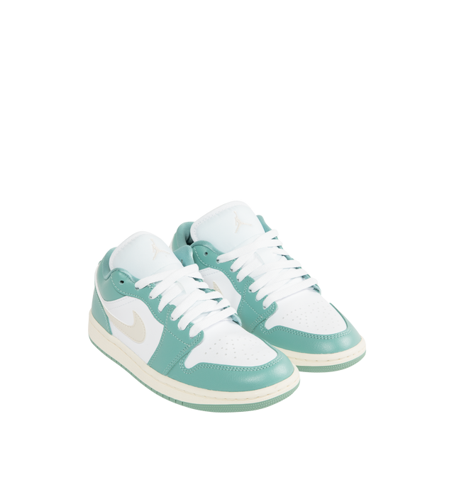 Image 2 of 5 - BLUE - NIKE Air Jordan 1 Low Sneaker featuring wings logo on the heel, stitched Swoosh design, perforated toe, foam midsole and rubber traction.