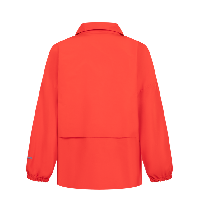 Image 2 of 3 - RED - Jil Sander Men's Technical Faille Blouson is crafted from technical faille and features a relaxed-fit silhouette with dropped shoulders, a stand collar, and a pack-away hood concealed within the collar. Designed for versatile everyday wear, this lightweight jacket is finished with a front zip closure, side welt pockets, a drawstring waist, elasticized cuffs, and a signature Jil Sander logo application at the sleeve. Main Material: 100% Polyester. Fit: Relaxed. Collar: Stand Collar with