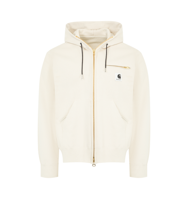 Image 1 of 2 - WHITE - SACAI X CARHARTT Cotton Zip Jacket featuring hood, zip closure, long sleeves, two front pockets, chest zip pocket, contrasting logo patch at the front and straight hem. 100% cotton. Made in Japan.