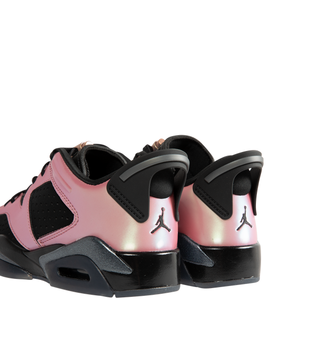 Image 3 of 5 - PINK - Air Jordan 6 Retro Low "Metamorphosis" Women's Shoes celebrate the 35th anniversary of the iconic AJ6 with a modern low-top silhouette inspired by Tinker Hatfield's original 1991 design. Featuring a sleek synthetic leather upper, visible Nike Air cushioning, and signature Jordan details, this commemorative style blends heritage performance with contemporary color blocking in Black and Desert Berry. Nods to Michael Jordan's championship-winning shoe include the iconic lace pocket, lac