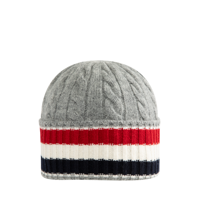Image 1 of 2 - GREY - Thom Browne Men's Cable & Rib Merino Wool Beanie is crafted from merino wool in a cable-knit construction and features signature RWB stripes at the rib-knit cuff and the brand's signature tricolor grosgrain loop tab at the back. This designer knit beanie combines timeless craftsmanship with iconic Thom Browne detailing for elevated cold-weather wear. Main Material: Merino Wool. Made in Italy.