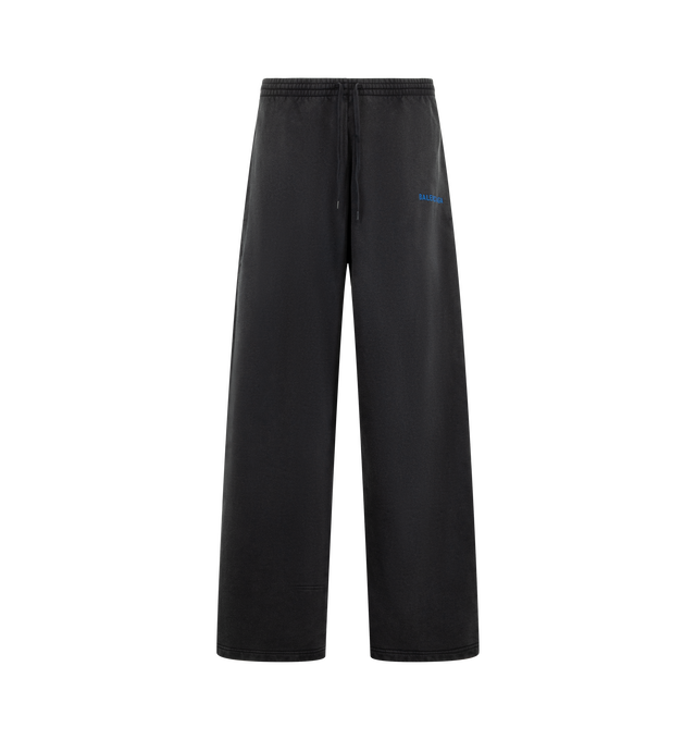 Image 1 of 3 - BLACK - Balenciaga Men's Balenciaga Back Oversized Baggy Sweatpants are crafted from faded black dry cotton fleece and feature a mid-rise, oversized silhouette. An elasticated drawstring waistband, two slash pockets, and Balenciaga logo embroidered at the front complete the design. Main Material: 100% Cotton. Pocket Lining: 100% Cotton. Embroidery: 100% Polyester. Made in Portugal.
