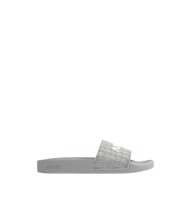 Image 1 of 4 - GREY - AMIRI MA Quad Pool Slides featuring rubber pool slides, logo pattern embossed throughout, open toe, logo embossed at vamp and outer side, molded rubber footbed and treaded rubber sole. Rubber.