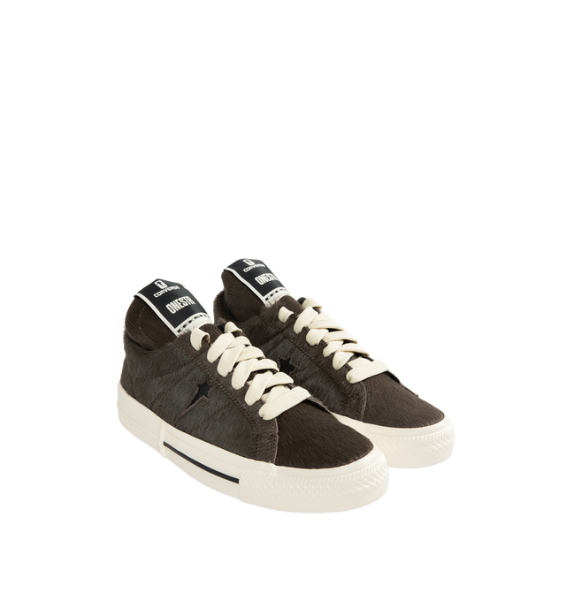 Image 2 of 5 - BLACK - DRKSHDW X CONVERSE Calf Hair Low-Top Sneakers featuring an extra-textured hair-on-hide leather upper with exaggerated width proportions, flat heel, round toe, lace-up vamp, signature DRKSHDW elongated tongue with woven label, custom DRKSHDW Star logo on the side, skateboard One-Star Converse sole, DRKSHDW license plate with pentagram collab logo on the left heel, Converse All-Star logo on the right heel and CX foam cushioned internal midsole.