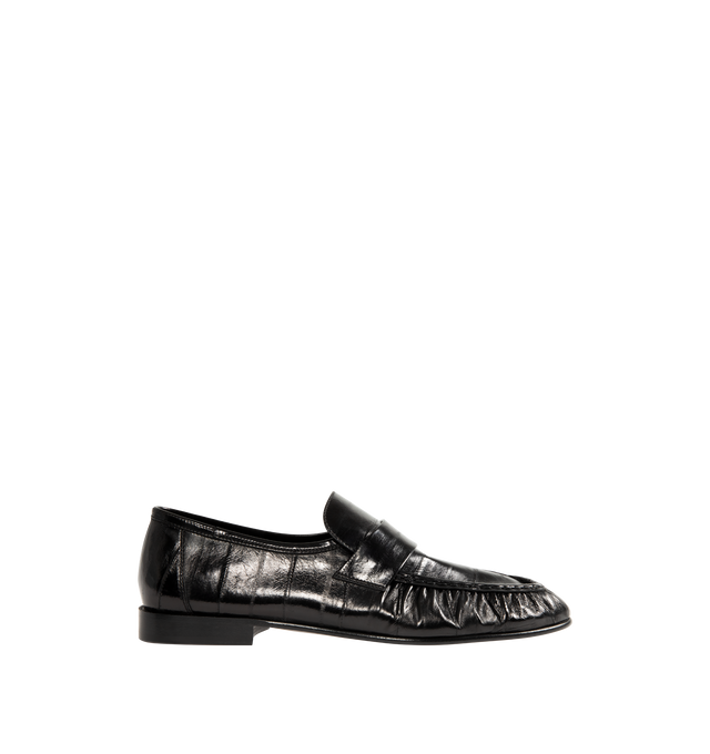 Image 1 of 4 - BLACK - THE ROW Soft Loafer featuring artisanally-crafted loafer in paneled eelskin leather with natural pleating effect and hand-painted leather sole. 0.79 in. heel. 100% eelskin leather. Made in Italy.