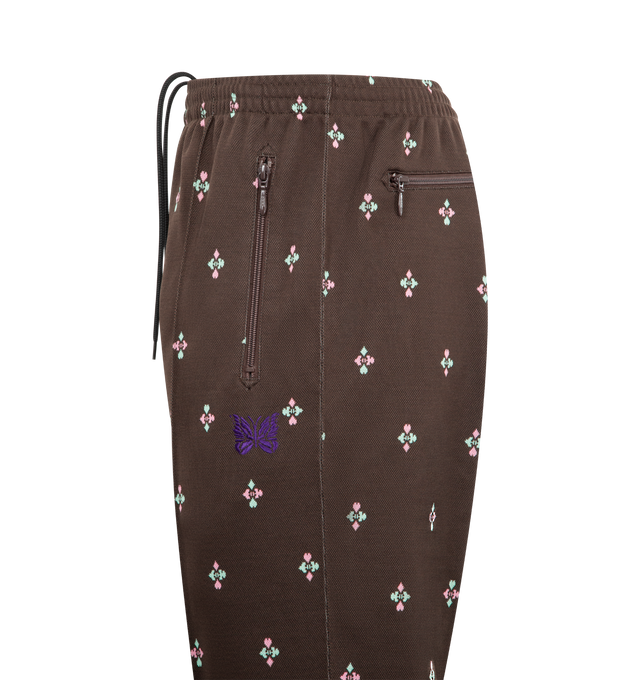 Image 3 of 3 - BROWN - NEEDLES Poly Jacquard Track Pants featuring breathable polyester, iconic butterfly embroidery, a relaxed silhouette, straight leg, zipped pockets and elasticated waist with drawstring. 100% polyester. Made in Japan.