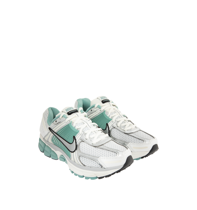 Image 2 of 5 - WHITE - NIKE Zoom Vomero 5 Sneakers featuring upper that mixes synthetic leather for a layered look, ventilation ports on the heel, Zoom Air cushioning, plastic caging on the side, metallic accents, foam midsole and rubber outsole.