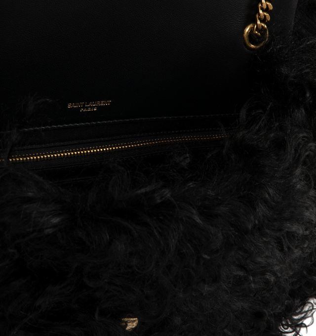 Image 4 of 4 - BLACK - SAINT LAURENT Jamie Medium Shearling Bag featuring a sliding chain strap for shoulder or crossbody carry, cotton lining, bronze-tone hardware and snap-button closure. 12.2" x 7.5" x 4.7". Single strap drop: 20.5". Folded strap drop: 10.6". Lambskin. Made in Italy.